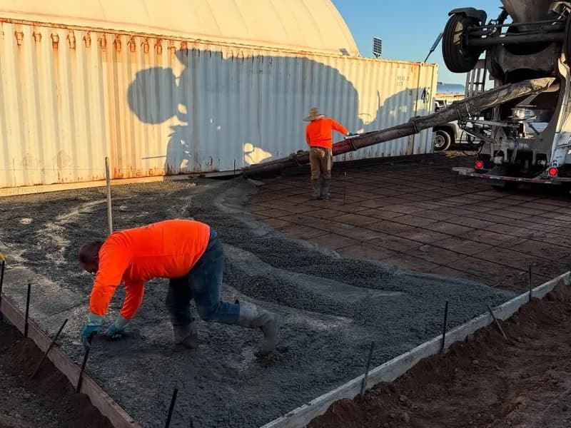 Triple Crown Construction equipment on a residential job site